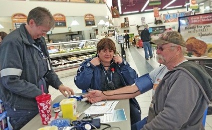 As part of EMS week, Unity EMS personnel set up a mobile clinic at Delta Co-op food store to check blood pressure, blood sugar and heart rate for those who wanted to participate. Photos by Sherri Solomko