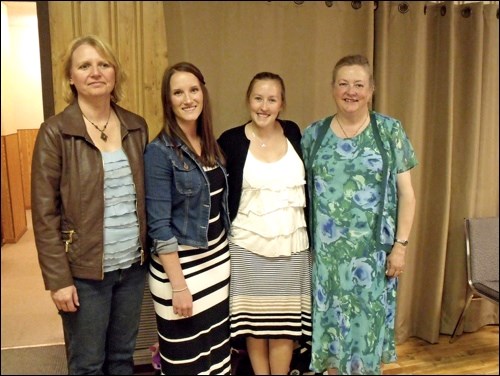 Head table guests at a bridal shower May 31 in Borden Judy Packett, Emiley Packet, Kim Emslie and Louise Saunders.A side winners of the Deifenbaker Daze Slo-pitch Tournament were Wheatking Prospects. Members are: back row - Carter and Dustin Bezugly, Derek Wall, Jackson Wiebe, Connor Wainwright, Jesse Pidwerbesky, Chris Anderson; front row - Robyn and Emma Pidwerbesky and Brooke Nutting. Photos by Lorraine Olinyk