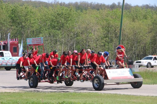 Big Red Bike rolls through for National Aboriginal Day