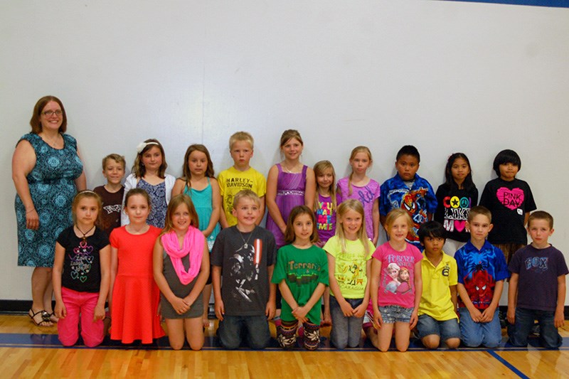 Grade 2 students from the Preeceville School receiving awards from Tonilee Sefton, teacher, from left, were: (back row) Renato Goossen, Lexi Prouse, Jenna Anaka, Luke Sandager, Tess Covlin, Aly Apland, Isabelle Payette, Franz Pinaroc, Jilliane Barnachea and Joy Singkala, and (front) Viktoriya Utkina, Amber Spray, Saphira Anaka, Alex Neilson, Maggie Bartel, Graison Belesky, Kacey Heskin, Yohan Quibod, Alex Prestie and Erron Bochnuik. Unavailable for the photograph was Sarah Masko.