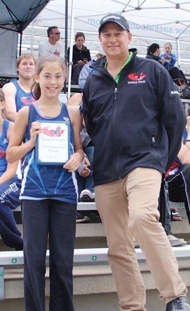 Kaitlyn Kelly was the winner of the 2016 YLTC Most Dedicated Athlete award. From left is: Kaitlyn Kelly, and Club Manager Marcel Porte