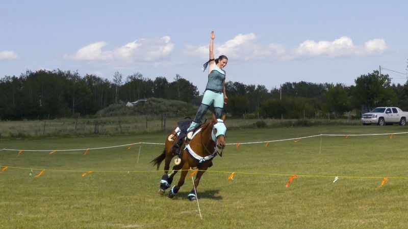 Callie Holodniuk, who with Marcia Griffith of Norquay, performed tricks riding on the backs of horses during the Arran centennial celebration.