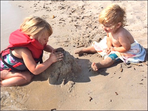 Sadly, summer is over and playing on the beach will soon be replaced by romping in piles of fallen leaves. Photos by Elaine Woloshyn