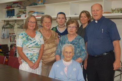 The St. Patrick's Sturgis and Preeceville councils of the Catholic Women's League of Canada welcomed Rev. Mark Miller to Preeceville. From left, were: (back row) Kathleen Pitt, Marj Bodnar, Natasha Lingl, Vicky Haskewich, Arlene Lingl and Miller and (front) Nellie Long.