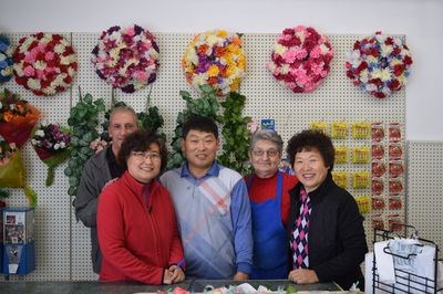 The Choi family members were proud to announce they were the new owners of Dennis Foods in Canora. From left, were: Gerald Dennis, Ann Choi, Sam Choi, Leona Kosar, and Sue Choi.