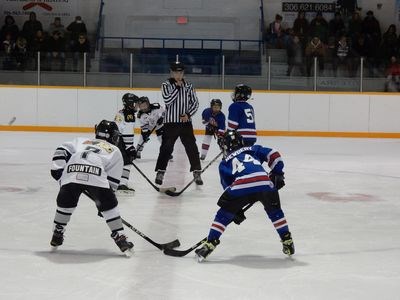 Ready for the faceoff against the Preeceville Pats in the third period were Chase Fountain, right wing, Wyatt Wolkowski, center, and Bronson Heshka, left wing.