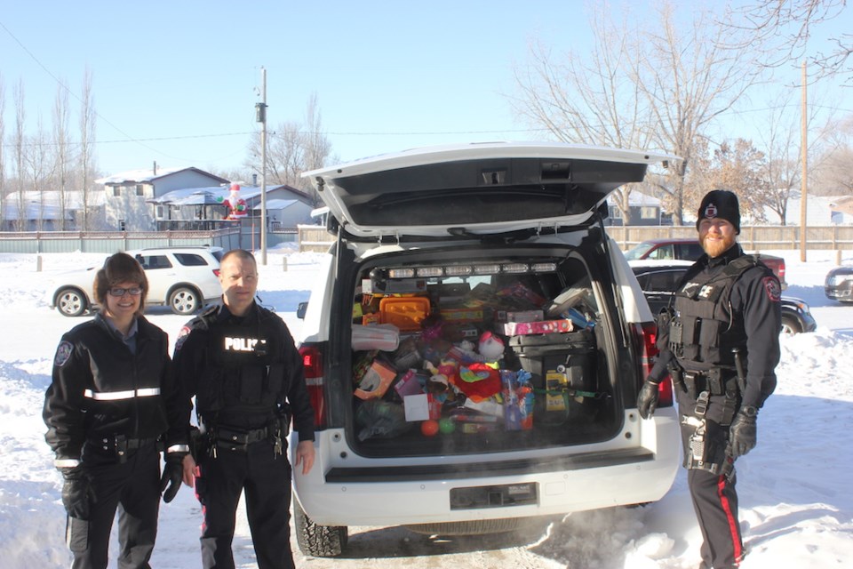 From the left, Special Const. Michelle Pickering, Const. Braden Lonsberry and Const. Trevor Roberts