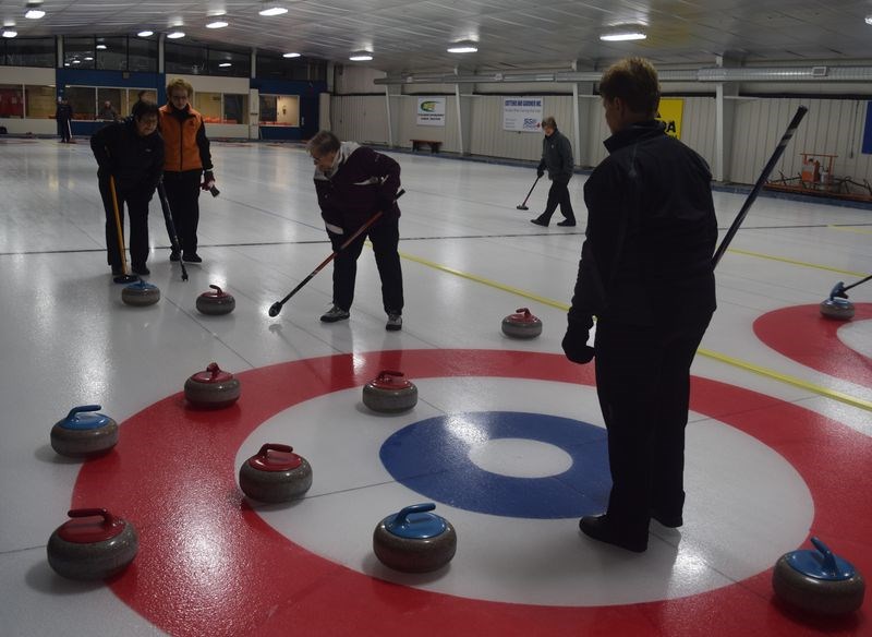 For fun and exercise, members of Kamsack’s Club 55 spend two afternoons a week curling at the Broda Sportsplex. Among the curlers on the ice last Thursday, from left, were: Marge Wonitowy, Joyce MacLean, Laurene Achtymichuck, Shirley Rudy (at back) and Jean Rose.