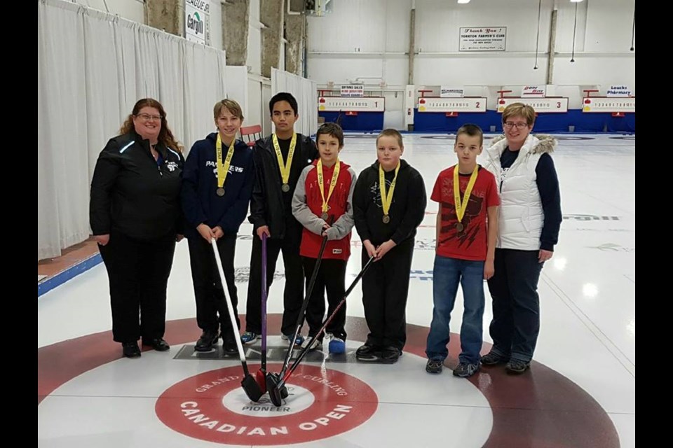 The Preeceville School junior boys curling team won bronze at the district competition held in Yorkton. On the team, from left, were: Donna Hamilton (coach), Erik Sandager, Wilien Paligan, Konnor Nenson, Mason Bilan, Anthony Ford and Bonnie Lisitza (coach).