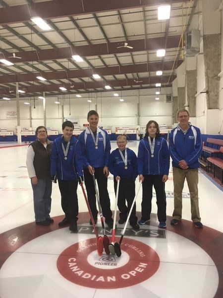 The KCI junior boys curling team won the gold medal at the district competition in Yorkton January 27 and 28. Members of the team, from left, are: Barb Tetoff (manager), Zach Zbeetnoff, Conner Bodnarek, Zach Chernoff, Curtis McGriskin and Scott Tulloch (coach).