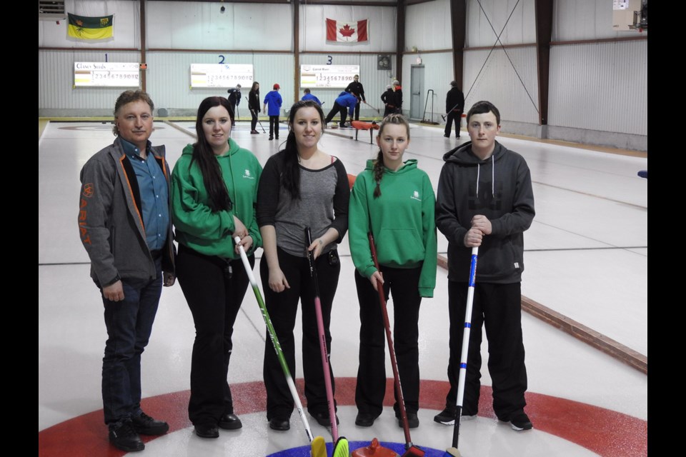 Members of the Kelvington 4-H Club senior curling team which won a third place at the regional bonspiel on January 28, from left, were: Carman Moxham (coach), Shandra Moxham, Sheena Moxham, Chelsey Moxham and Bradley Elmy.