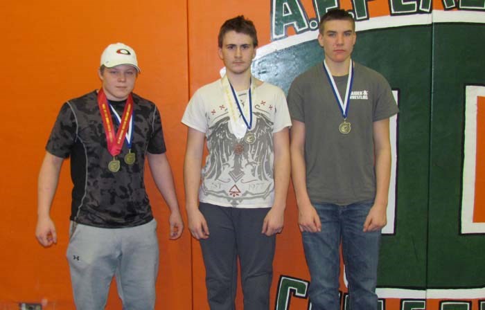 Jordan Stewart, Kurt Hoffman and Riley Richards (left to right) with medals from the most recent tournament in Moose Jaw. Team member Kahrina Cameron is missing from photo as she was injured in the tournament.