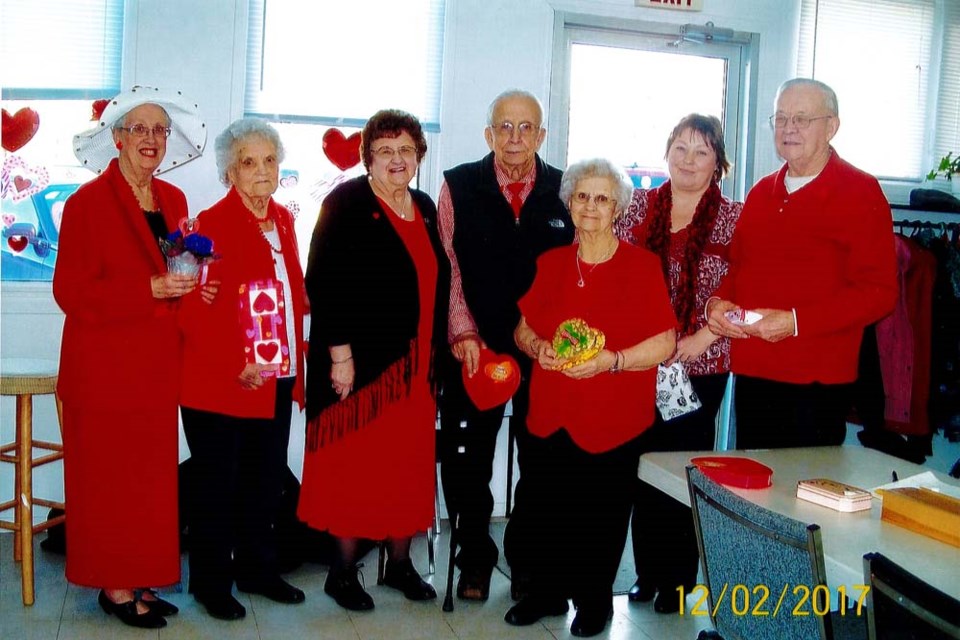 Placing first to seventh in the Keen Age Centre valentine dress-up contest, from left, were: Marie Waselyshen, Grace Chase, Nettie Okrainetz, Mike Waselyshen, Merle Tratch, Lorilee Chaikowski and Peter Wiebe.