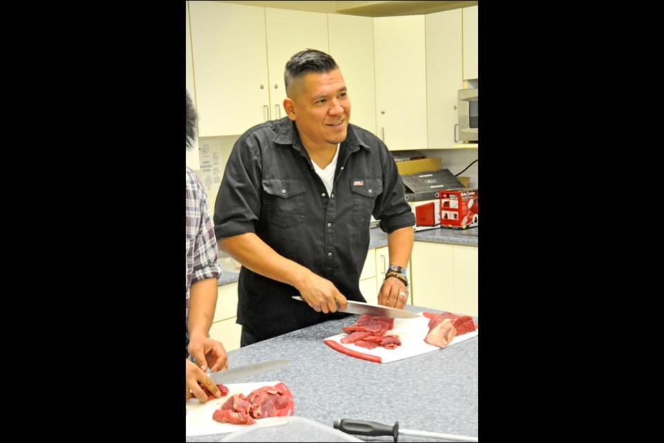 Rich Francis, chef and owner of Aboriginal Culinary Concepts, showed off his ideas on “modern aboriginal cuisine” to students at Sakewew High School on Wednesday afternoon. It’s part of his series of workshops on “cooking and reconciliation.” Photos by John Cairns