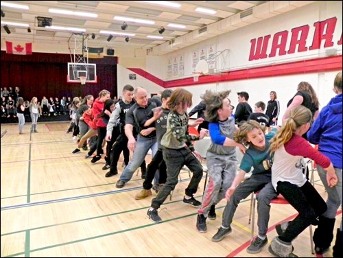 Students, staff and community members play competitive musical chairs for a good cause at UCHS on Feb. 28. Contributions were added to the UCHS total going towards the “Unite for a Miracle” fundraising campaign. Photos by Sherri Solomko