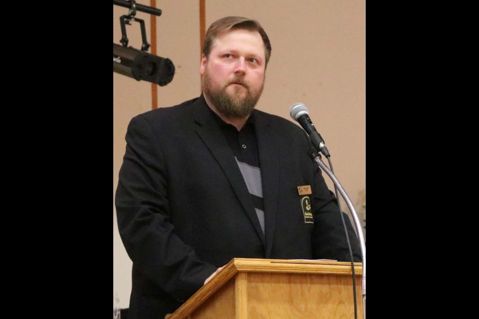 Saskatchewan Wildlife Federation president Heath Dreger addresses the crowd of approximately 150 people at the YWF banquet.