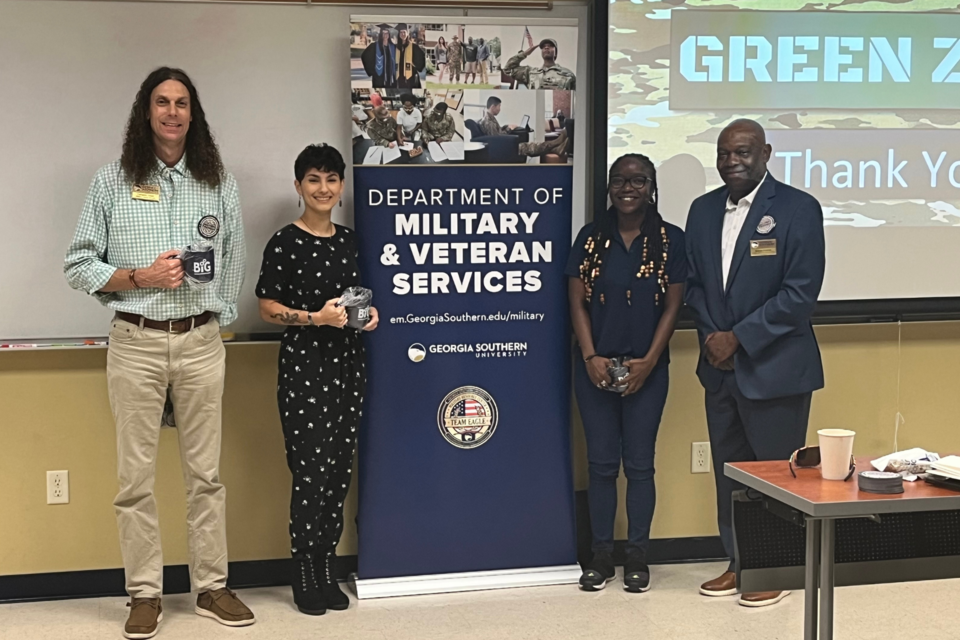 Colonel George Fredrick, Ed.D. (far right) pictured with Georgia Southern Military Resource Center Student Workers and Veteran Project Coordinator (Cameron Jones, far left)