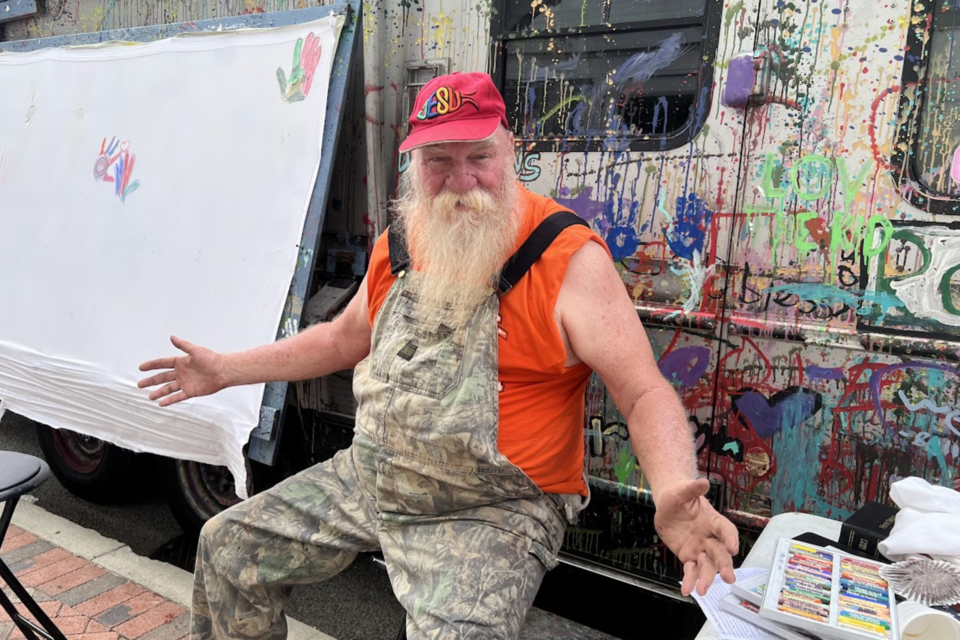 Traveling artist Paul Wislotski outside the Averitt Center for the Arts in Statesboro, GA