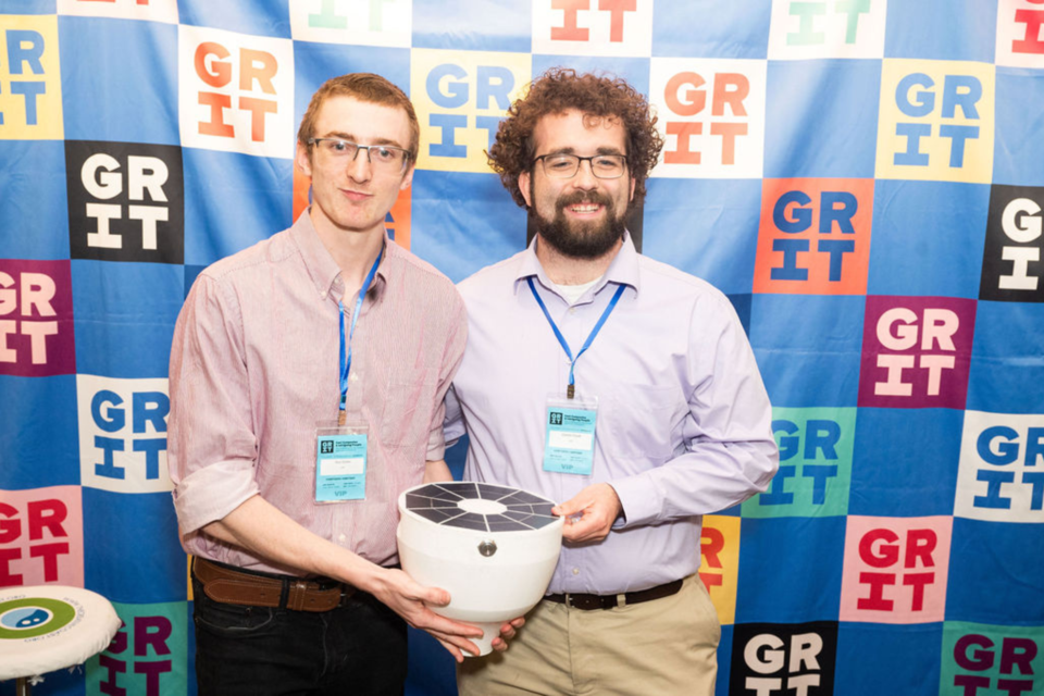 guy-gober-l-and-garrett-stigall-r-holding-their-product-sam-startup-stage-winners