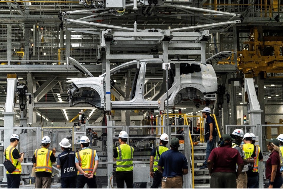 hyundai-motor-group-metaplant-america-employees-watch-as-a-pre-production-ioniq-9-makes-its-way-through-general-assembly-in-ellabell-ga-in-november-2024