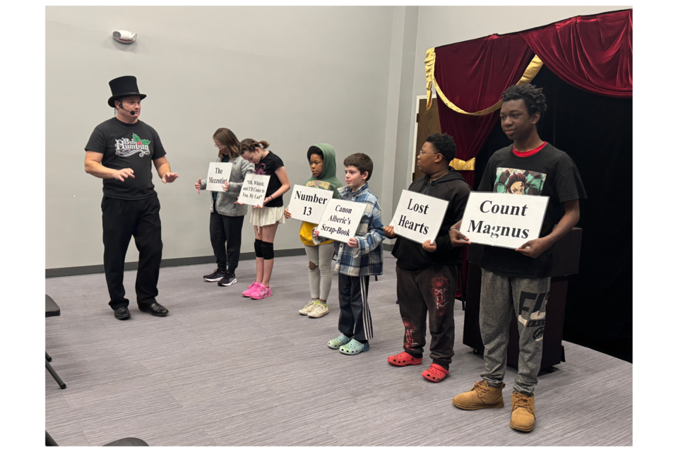 Chad Crews, magician, entertained a room full of people at the Statesboro-Bulloch County Library. 