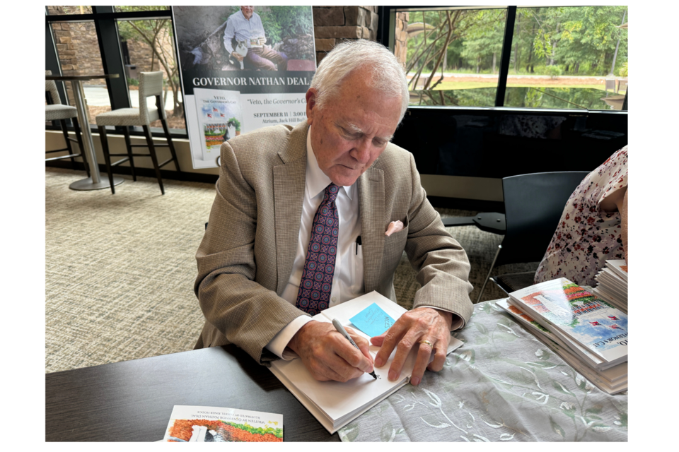 Former Governor Nathan Deal signed his book for fans at OTC. 