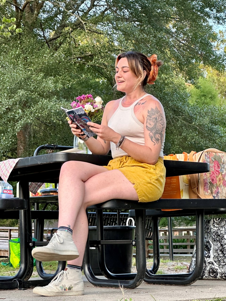 julianna-leverette-reading-from-who-i-am-today-at-the-poetry-and-picnic-prerelease-party-held-at-shelby-park-in-the-boro-the-night-before-the-book-dropped