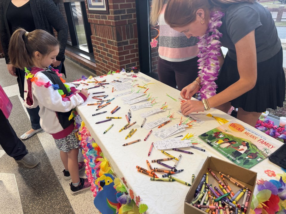 literacy-luau-volunteer-and-student