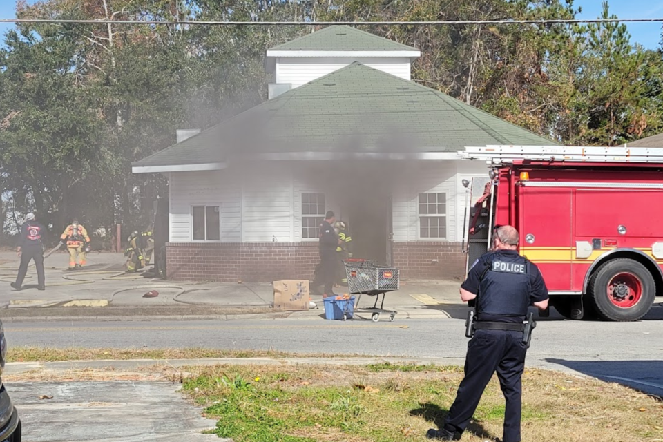 Firefighters attacking fire on East Main 