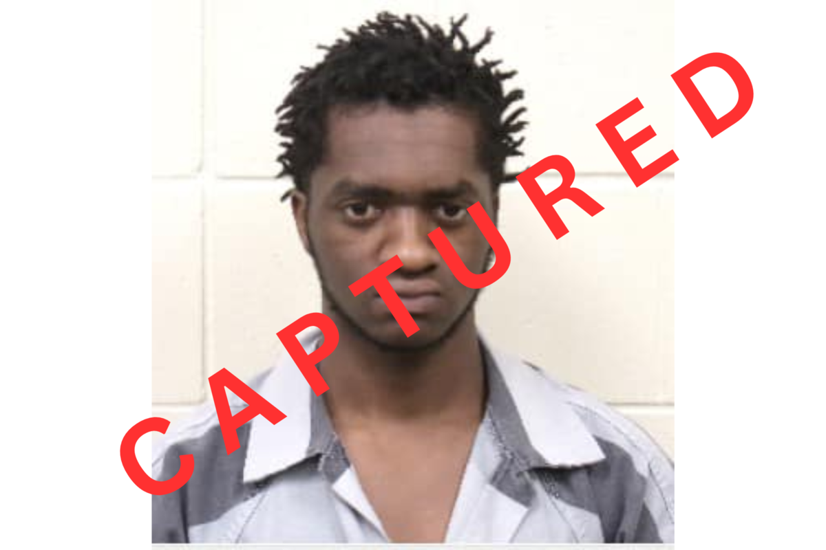 Officials have taken into custody an inmate who escaped on foot in downtown Statesboro