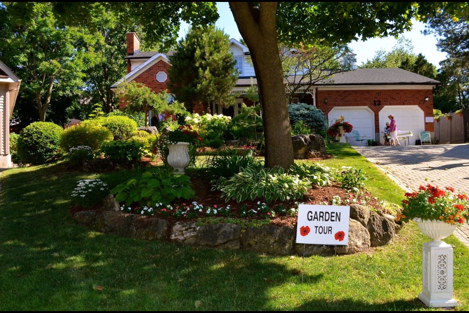 A Blooming Lovely Tour 22 Photos Guelphtoday Com A View From The Street Of John And Mary Mcgimsie S Sugar Bush Splendour Garden On Pickwick
