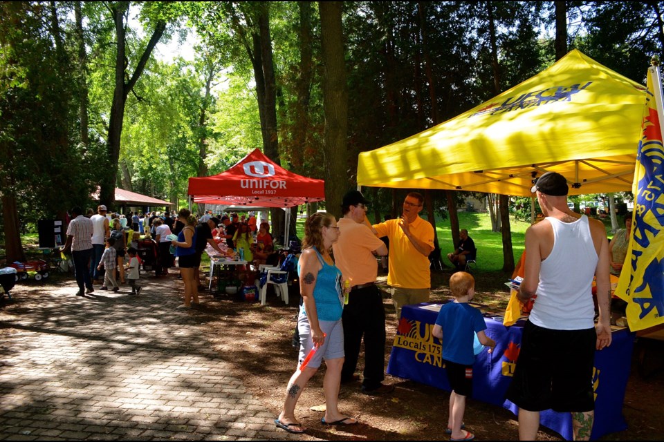 Labour groups line the path during the 2018 Labour Day Picnic at Riverside Park.Troy Bridgeman for GuelphToday