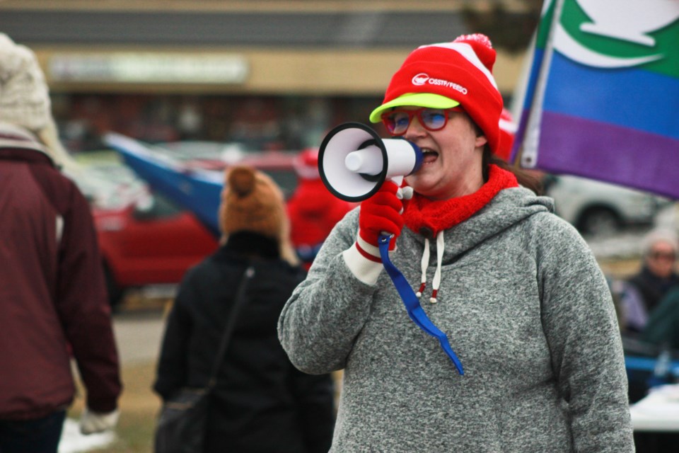 Erin Doupe leads chants at John F. Ross. Anam Khan/GuelphToday