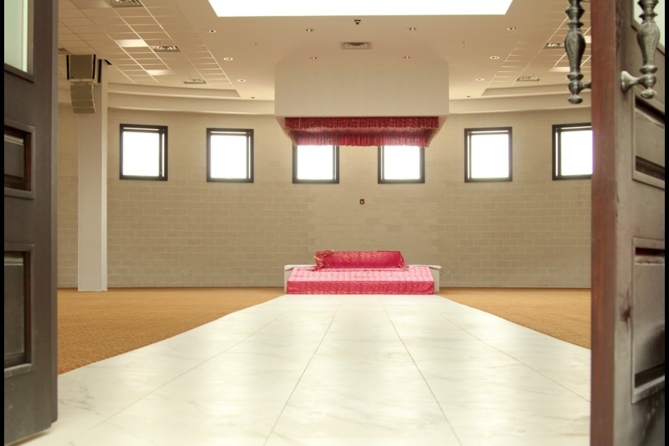 Main stage for congregational prayer. This 18,000 square foot hall will be able to accommodate Guelph's 500 Sikh families. The gurdwara is waiting on the city permit to open its doors and has yet to add many finishing touches that include furnishing the building and completing the kitchen of the langar hall. Anam Khan/GuelphToday