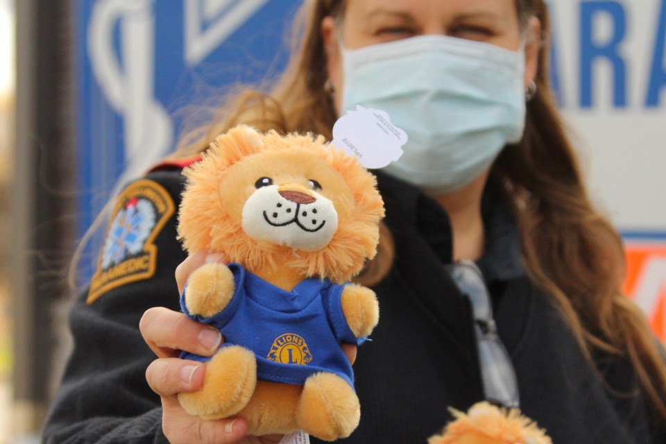 Deputy chief Leanna Swantko holds a stuffed lion donated by the  Guelph Lions Club. 