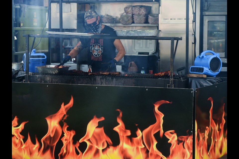 Cooking up the ribs. Tony Saxon/GuelphToday