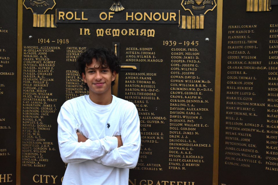 Thomas Szabo stands in front of the Guelph Cenotaph where a scroll for Sgt. Joseph Yemen will be added.