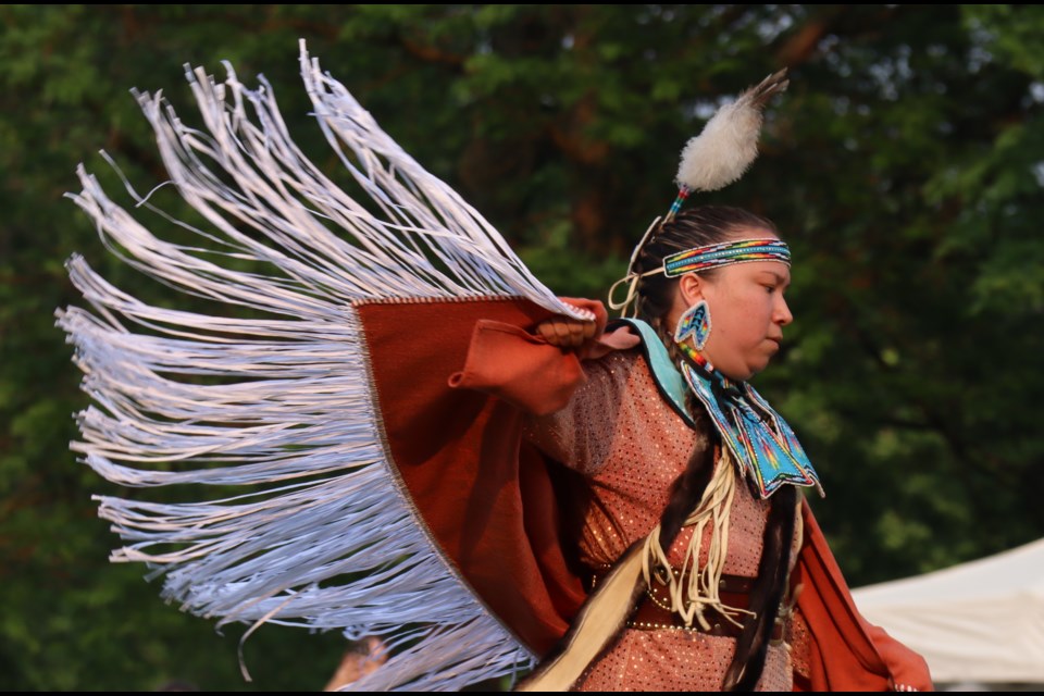 Performing the butterfly dance for National Indigenous Peoples Day at Riverside Park.