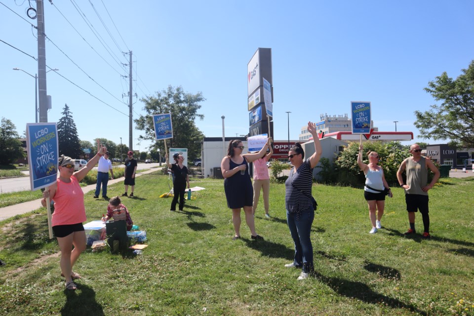 OPSEU Local 232 rally on the corner of Stone Road and Scottsdale Drive.