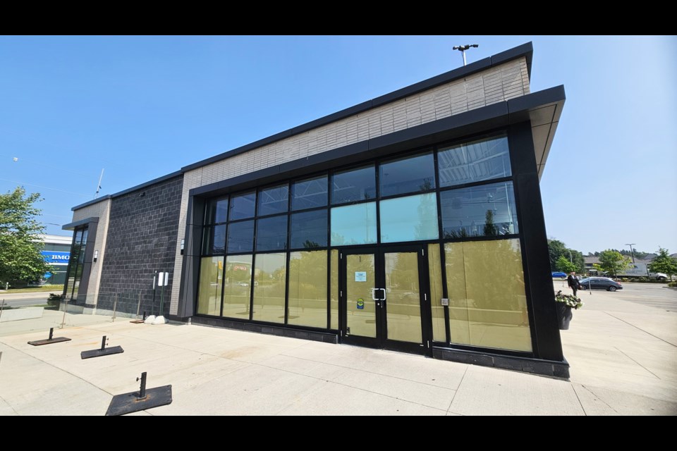 The windows are covered in paper at the former Blaze Pizza location in Guelph.