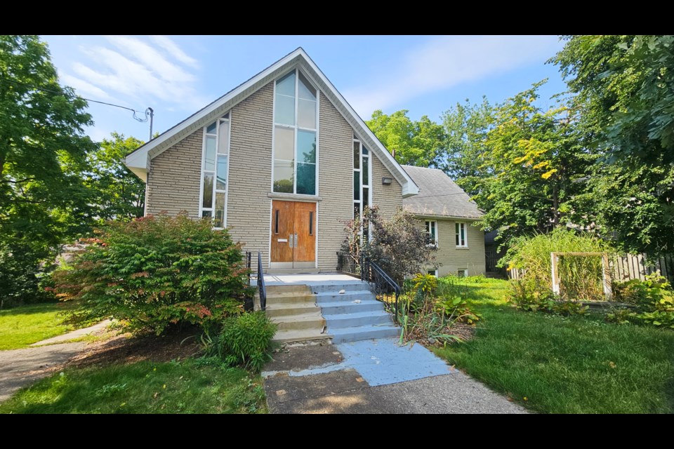 This church building at 8 Mitchell St. is proposed to be torn down and replaced with two semi-detached homes, each with two internal accessory units for a total of 12 residential units.