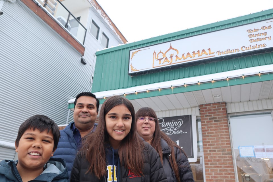 Sabir, Shahed, Sahara and Sabrina outside their soon to open restaurant Taj Mahal.