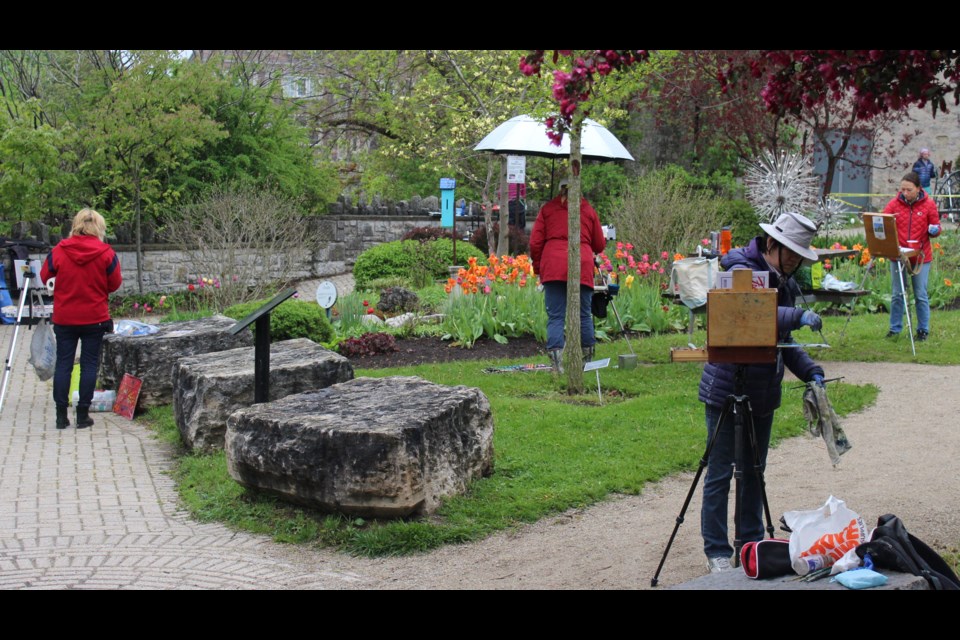 A gathering of artists capturing the beauty of Templin Gardens. Painters had two hours and a blank canvas to deliver a piece of art for judging. The competition was part of the Plein Air Festival.