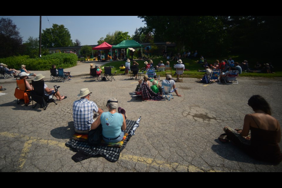 A socially-distanced crowd enjoys the free Hillside Homeside pop-up gospel concert Sunday morning at the Ignatius Centre. Tony Saxon/GuelphToday