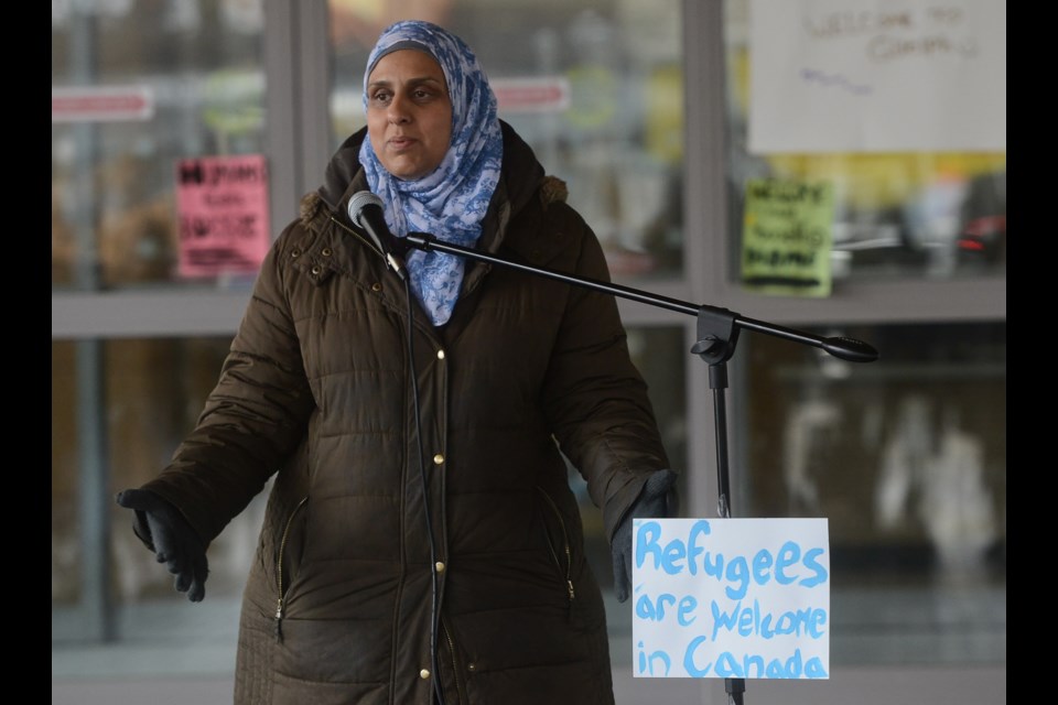 Sarah Sayed speaks on behalf of the Muslim Society of Guelph at a pro-refugee rally in Market Square Saturday. Tony Saxon/GuephToday