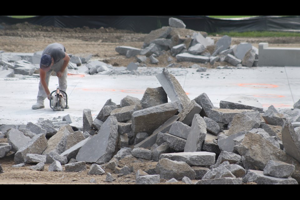 Workers were on scene at Margaret Greene Park Monday morning tearing up the concrete it had set down for a splash pad.