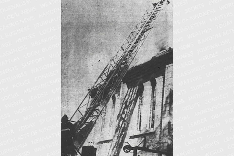 Firefighters tackle a fire at First Baptist Church in 1963.