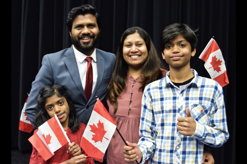 The Prince family after the citizenship ceremony at Bishop Macdonell Catholic High School.