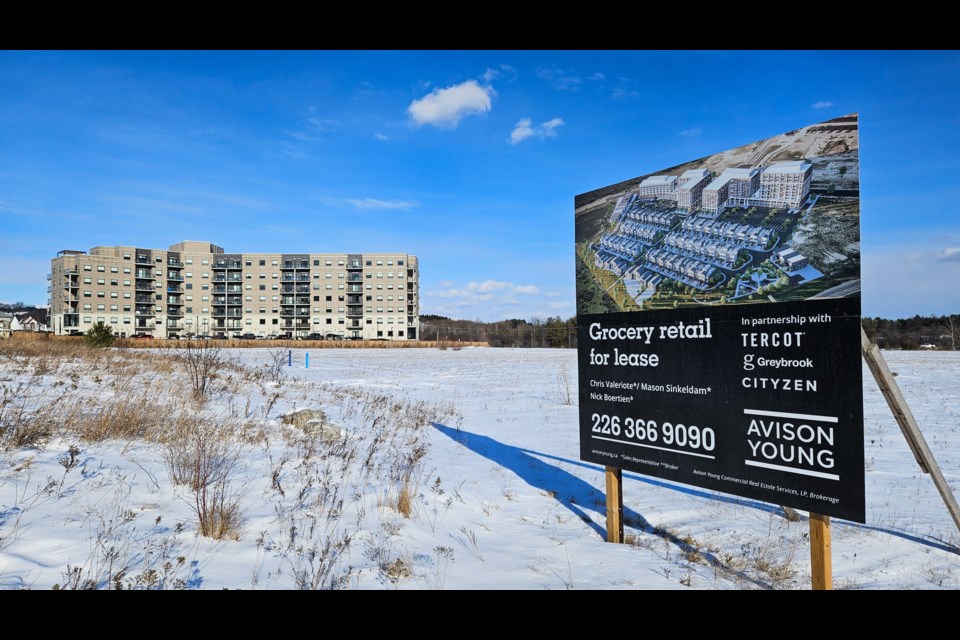 A developer proposes to build four apartment buildings ranging between nine and 14 storeys tall, with 928 collective units, along with 31 on-street townhouses, 170 back-to-back townhouses and 2,818 square metres of commercial space at 115 Watson Pkwy. N.