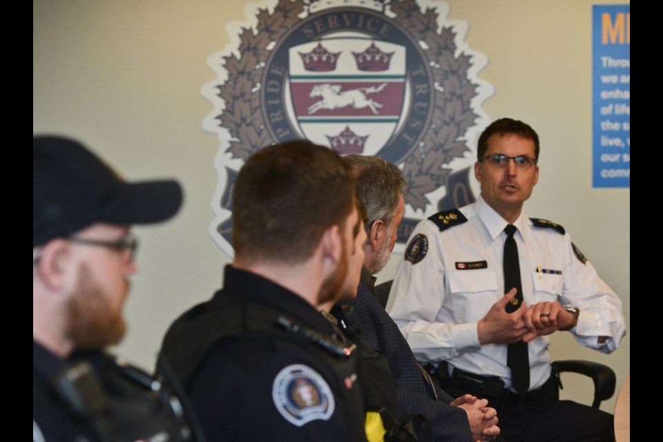 Guelph Police Chief Gord Cobey speaks at a news conference watched by the new dedicated downtown police officers on Thursday at police headquarters. Tony Saxon/GuelphToday